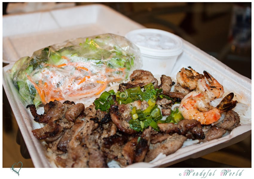 Grilled pork and shrimp plate with salad